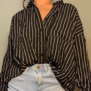 Cute button down. Flowy and has an open back.